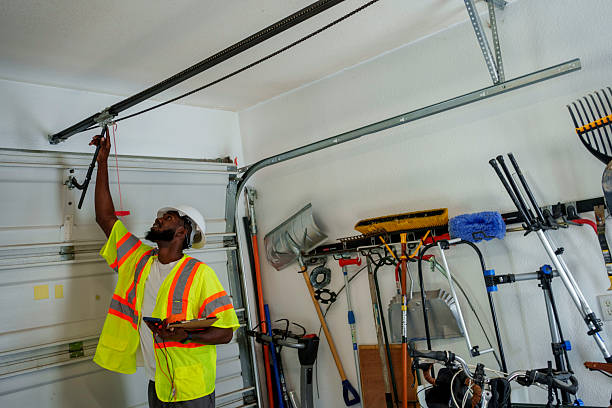Professional Garage Door Panel Replacement technician working in Hydro, OK